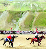 Polo players in action during a tournament in Drass on Saturday.