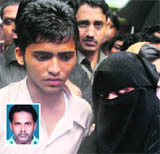 Rubaida Usmani, (right) with her son, waits to receive the body of her husband Fayaz Usmani (inset) outside a hospital in Mumbai on Sunday.