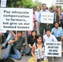 Buyers of disputed Noida Extension flats sit in protest in Noida