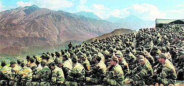 Army personnel pay tribute to martyrs at Umbala Top to mark the 12th anniversary of Indias victory in the 1999 Kargil War.