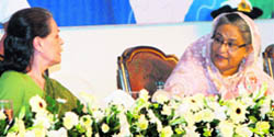 Congress president Sonia Gandhi with Bangladeshs Prime Minister Sheikh Hasina during an international conference on autism in Dhaka on Monday.