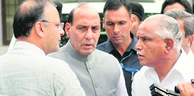 Karnataka Chief Minister BS Yeddyurappa (extreme right) with senior BJP leaders Arun Jaitley and Rajnath Singh after a party meeting in Bangalore 