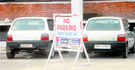 Vehicles parked in a no-parking zone.
