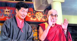 Lobsang Sangay with the Dalai Lama after taking the oath as Prime Minister of the Tibetan government-in-exile in McLeodganj on Monday.