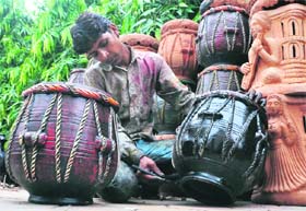 HAND MADE: An artist busy giving finishing touches to his creation