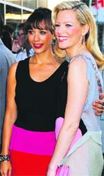Sibling revelry: Actors Rashida Jones and Elizabeth Banks (R) pose at the premiere of their new film Our Idiot Brother in Hollywood, California