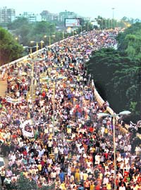 DELHI CHOKED: Anna Hazares supporters take out a maharally in Delhi on Sunday