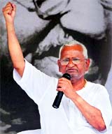 Anna Hazare addresses supporters on the eighth day of his fast on Tuesday.