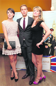 Alice St Clair, Dan Amboyer and Lesley Harcourt pose for a picture as they arrive at the premiere for William & Catherine: A Royal Romance in New York City