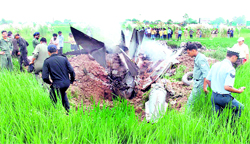 The wreckage of the MiG-21 aircraft that crashed in a paddy field near Shambhu toll barrier in Rajpura on Tuesday morning