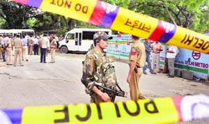 After the blast: Security personnel outside the Delhi High Court on Wednesday. 