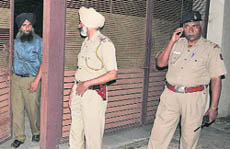 Policemen outside Gaganjit Barnalas house in Chandigarh.