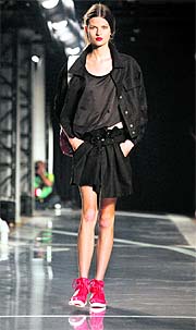 A model presents a creation from the Y-3 Spring/Summer 2012 collection during New York Fashion Week