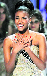 Miss Angola Leila Lopes reacts after being named Miss Universe 2011, and before being crowned at the Miss Universe pageant in Sao Paulo, Brazil