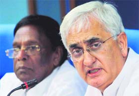 Union Law Minister Salman Khursheed with MoS in PMO V Narayansamy at a press meet in New Delhi on Wednesday