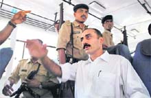 Sanjiv Bhatt coming out of an Ahmedabad court