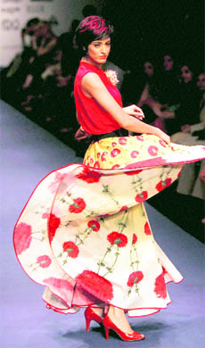 A model displays a creation of designer Ritu Kumar during the second day of the Wills Lifestyle India Fashion Week Spring Summer 2012, in New Delhi.
