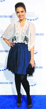 Actress Jessica Alba arrives at The Clinton Foundation Gala in celebration of the organisation's Decade of Difference in Los Angeles.—