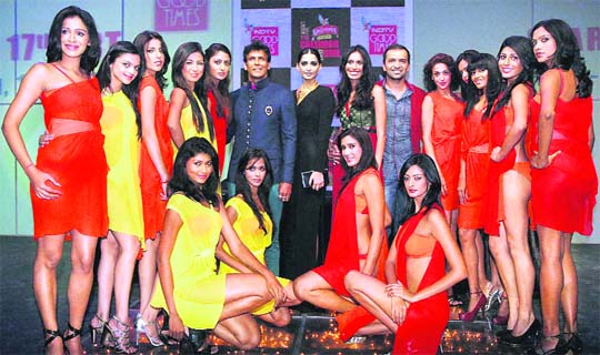 (Middle from left) Bollywood actor Milind Soman, actress Sonam Kapoor, model Ujjwala Raut and photographer Atul Kasbekar with other models during the launch of Kingfisher Calendar Girl 2011 contest in Mumbai.