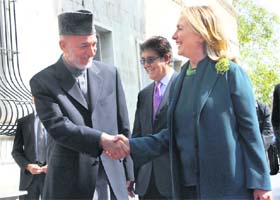 US Secretary of State Hillary Clinton with Afghanistan President Hamid Karzai in Kabul on Thursday