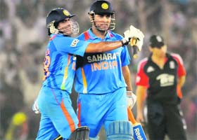 Ravindra Jadeja celebrates with his skipper MS Dhoni after India defeated England by five wickets in the 3rd ODI at Mohali on Thursday