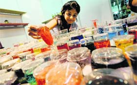 A young girl admires designer candles on display at Civil Lines in Ludhiana on Sunday
