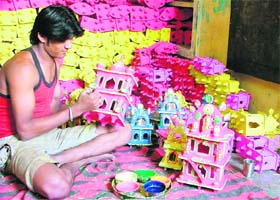 A craftsman gives final touches to a “Hatadi” in Ludhiana