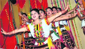 Girl students present a ‘Bamboo Dance’ during a function at the Khalsa College for Women in Ludhiana
