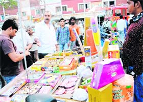 The MC fire department team cracks a whip on illegal cracker sellers in Sector 26, Chandigarh, on Monday