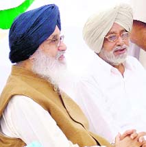 Parkash and Gurdas Singh Badal (R) at a function in Badal village on Sunday.