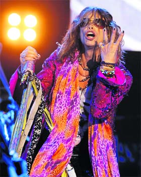 HOT PINK: Steven Tyler, the lead singer of rock band Aerosmith, performs during a concert on the first stop of their Latin America tour at the Jockey Club in Asuncion