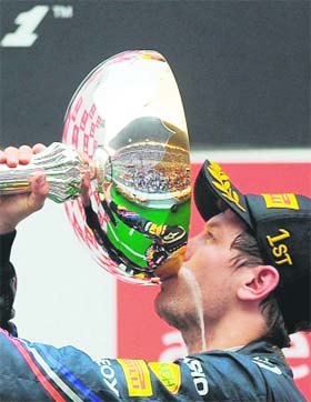 CUP OF JOY: Sebastian Vettel with his prized possession
