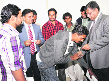 Indians, who have returned from Iraq, with Acting Chief Justice of the Punjab and Haryana High Court Justice MM Kumar in Chandigarh on Monday. 