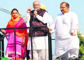BJP leader LK Advani addresses a rally at Bathindas Hanuman Chowk on Sunday during the Punjab leg of his Jan Chetna Yatra. He is accompanied by SAD leader and MP Harsimrat Kaur