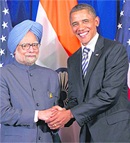 Prime Minister Manmohan Singh shakes hands with US President Barack Obama during the bilateral meeting in Bali, Indonesia, on Friday.
