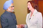 PM Manmohan Singh with his Australian counterpart Julia Gillard in Bali 