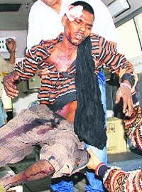 An injured inmate being taken to a hospital