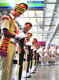 Remembering 26/11 victims: Policemen pay tributes to the victims of 26/11 terror attack at the CST railway station in Mumbai on Saturday