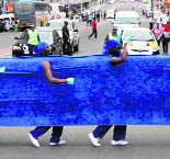 People take part in a rally in Durban.