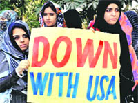 Pakistani students protest against NATO and the United States in Lahore on Tuesday. 