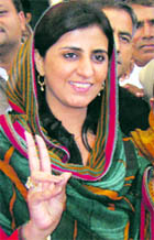 HJC candidate Renuka Bishnoi flashes a victory sign in Adampur on Sunday. She defeated Kulbir Beniwal (Cong) by 22,669 votes.