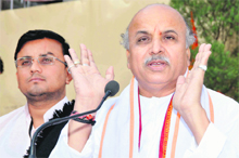 Praveen Togadia, international general secretary of VHP, addresses a press conference in Dehradun on Tuesday. 