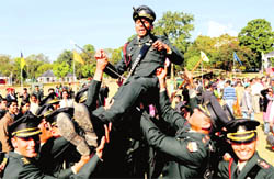 A Gentlemen Cadet being tossed in the air by his colleagues at the Indian Military Academy in Dehradun on Saturday