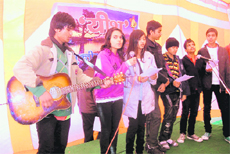 Students from the Firs Foundation sing Christmas carols at Mussoorie on Saturday.