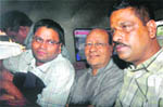 AMRI Hospital owner industrialist RS Goneka (C) in police custody. 