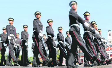 Gentlemen Cadets take part in the passing-out parade at the Indian Military Academy in Dehradun on Saturday. A total 615 Cadets passed out to join the Army as officers after completing their training