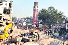 The demolition of the shops continued on the second consecutive day on the Chakrata road in Dehradun on Monday