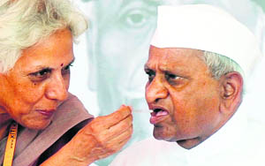 A doctor examines fasting Anna Hazare in Mumbai. 