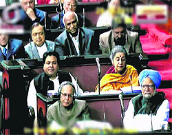 PM Manmohan Singh, Finance Minister Pranab Mukherjee and other Congress leaders during the debate on Lokpal Bill in the Rajya Sabha in New Delhi on Thursday