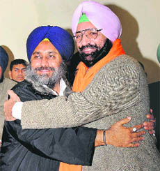 SAD chief Sukhbir Badal with Malwinder Singh on Saturday
